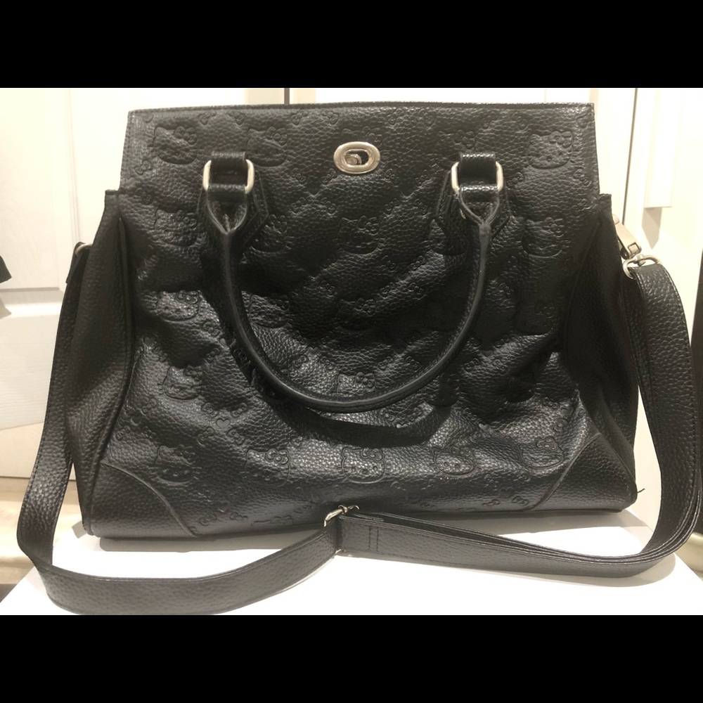Large black Hello Kitty Embossed Purse $35